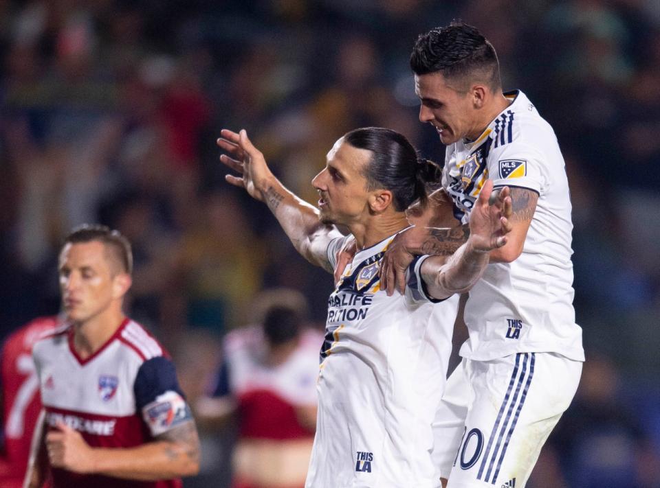 Galaxy star Zlatan Ibrahimovic (center) had nothing but praise for new teammate Cristian Pavon. Major League Soccer is a different story. (Reuters)