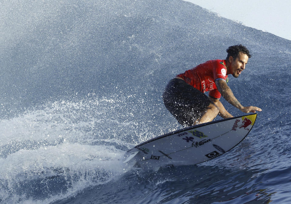 Surfer Italo Ferreira of Brazil competes on his way to winning the latest competition of the World Surf League Championship Tour in Teahupoʻo in Tahiti on May 30, 2024. (Kyodo News via AP)