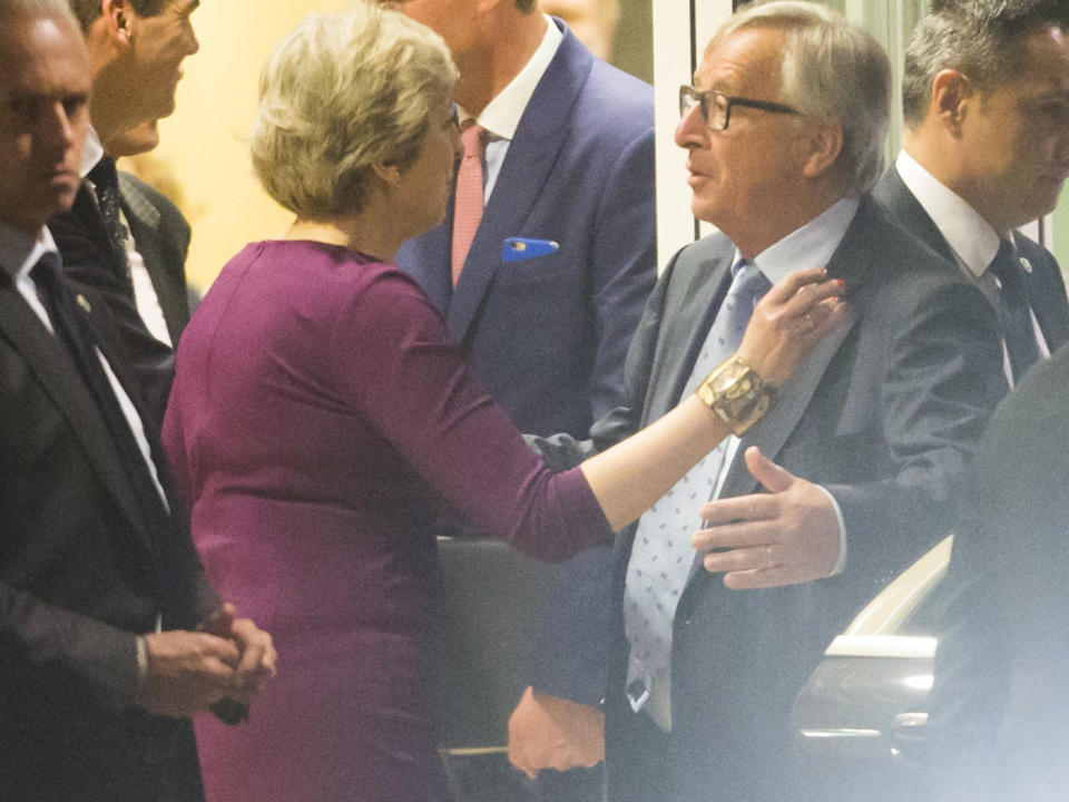 Theresa May and Jean-Claude Juncker at the end of a Brexit dinner-meeting in Brussels: EPA