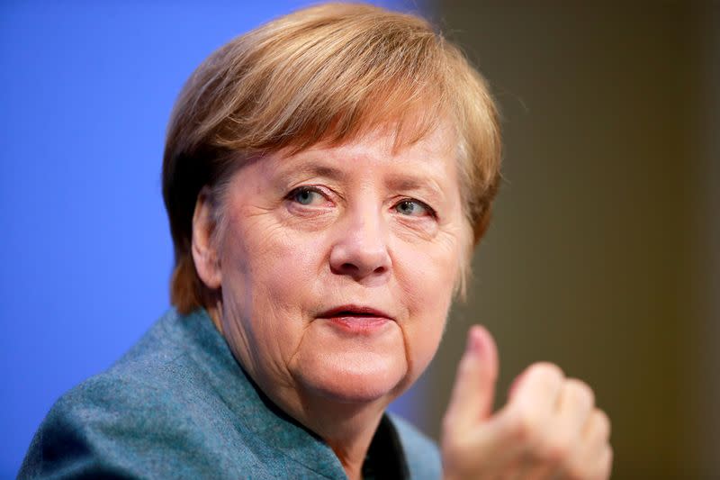 FILE PHOTO: FILE PHOTO: German Chancellor Merkel holds a news conference in Berlin