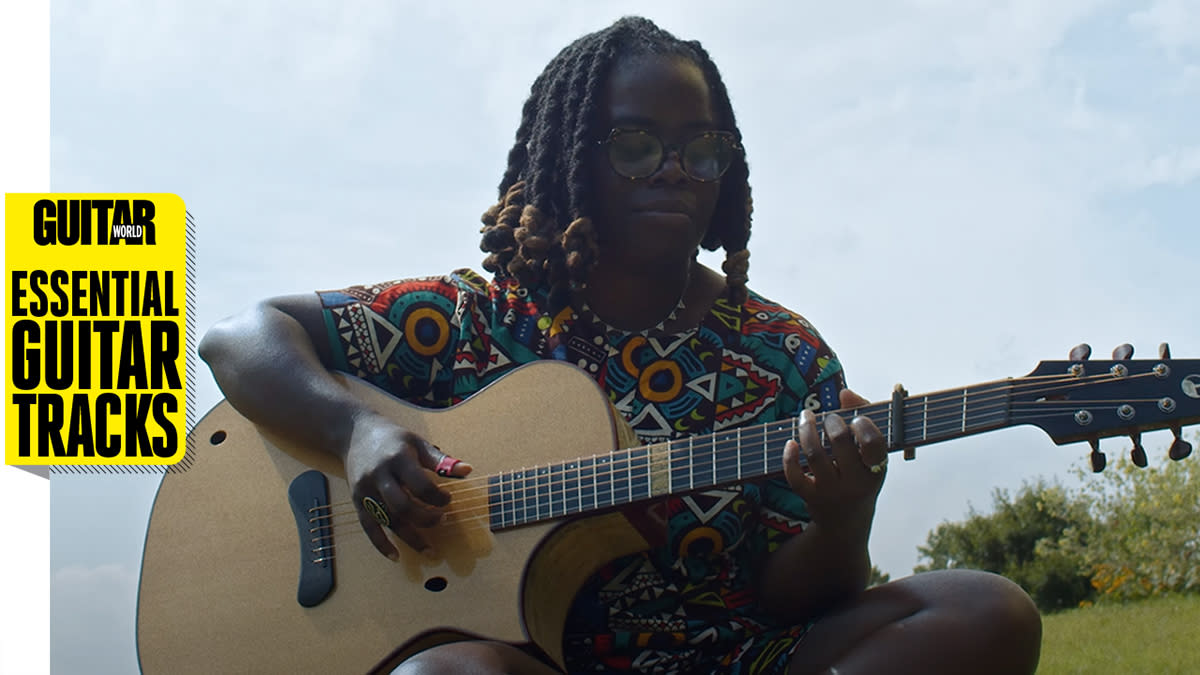  Yasmin Williams playing acoustic guitar, with the Guitar World Essential Guitar Tracks logo overlayed. 
