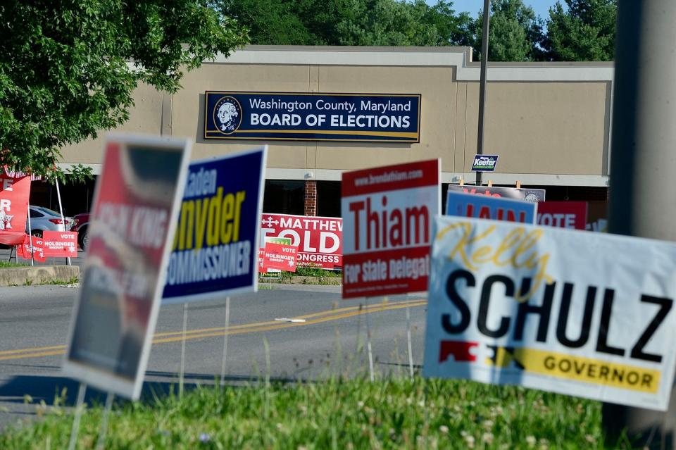 Campaign signs stand along the entrance to the polling place at the Washington County Board of Elections on Virginia Avenue on Tuesday, July 19, 2022.