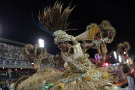 A performer from the Grande Rio samba school parades during Carnival celebrations at the Sambadrome in Rio de Janeiro, Brazil, Monday, Feb. 24, 2020. (AP Photo/Leo Correa)