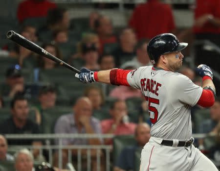 Sep 4, 2018; Atlanta, GA, USA; Boston Red Sox first baseman Steve Pearce (25) hits a two RBI single scoring third baseman Rafael Devers (not pictured) and second baseman Ian Kinsler (not pictured) in the sixth inning against the Atlanta Braves at SunTrust Park. Mandatory Credit: Jason Getz-USA TODAY Sports