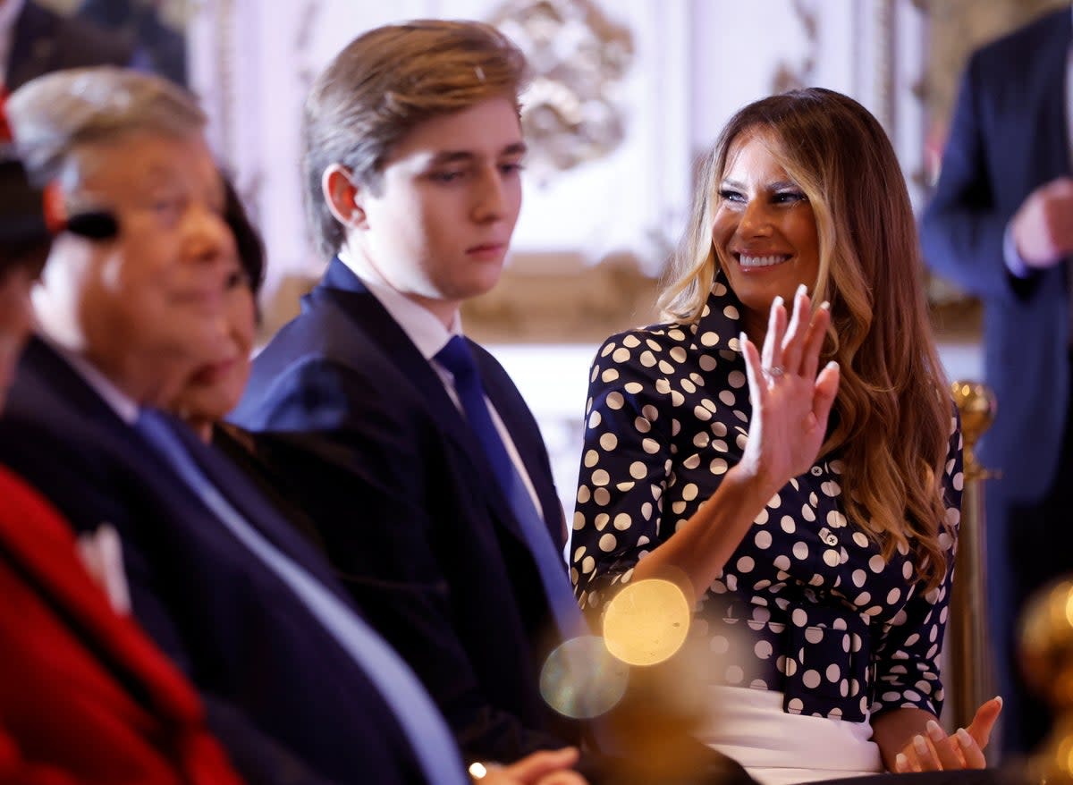 Barron Trump with his mother Melania Trump and grandparents sitting in the front row as his father announces that he would once again run for the presidency (Reuters)