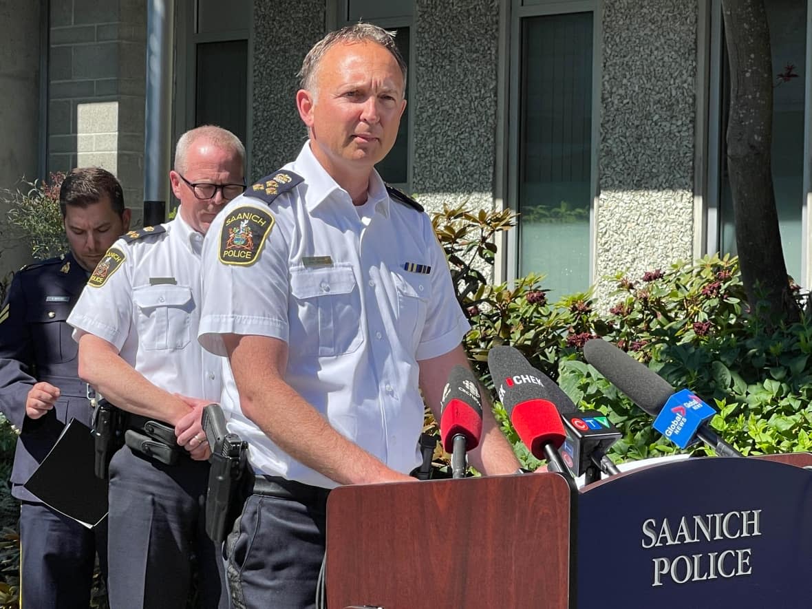 Saanich police Chief Dean Duthie speaks to reporters on Thursday but was unable to offer few new details two days after a deadly bank robbery. (Susana da Silva/CBC - image credit)