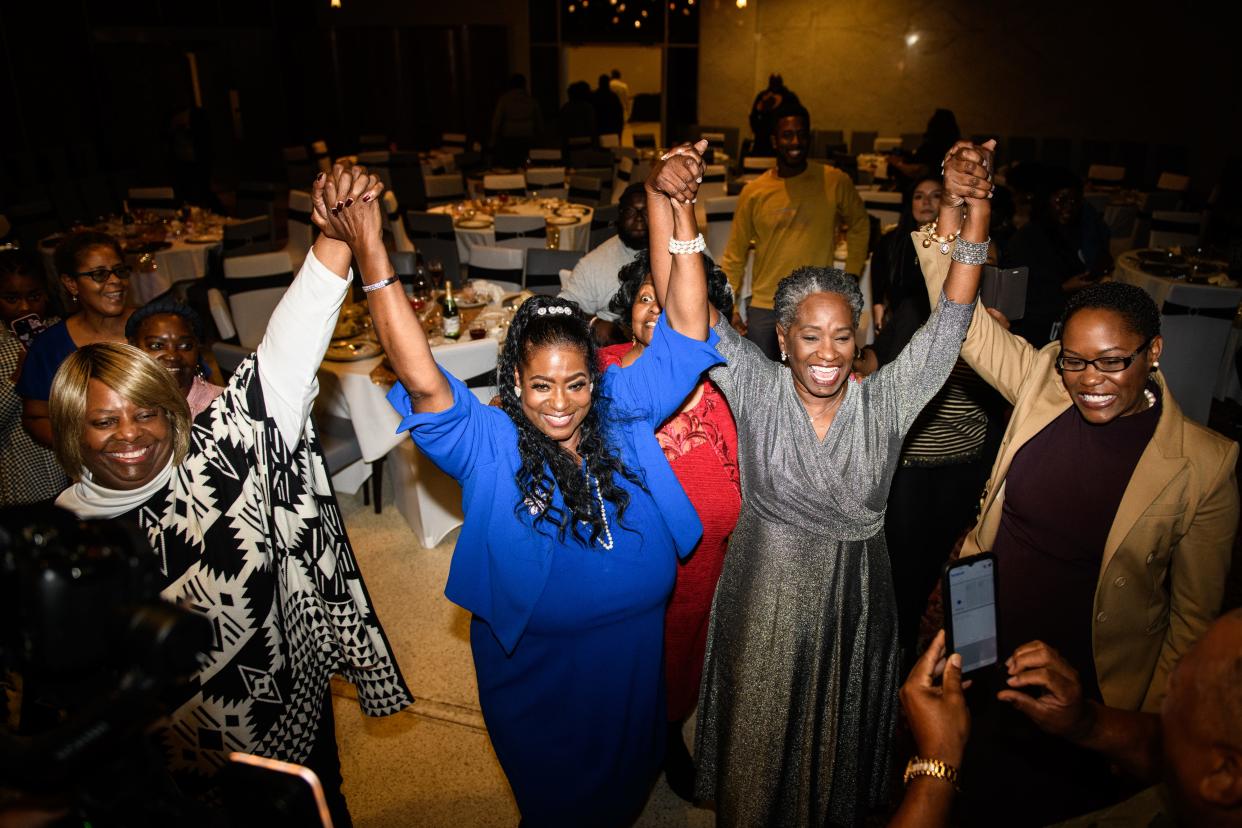 Frances Jackson, Veronica B. Jones, Val Applewhite and Rosalyn Hood after winning their individual races on Tuesday, Nov. 8, 2022, at the Metropolitan Room in Fayetteville.