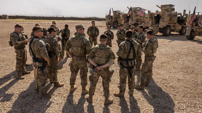 U.S. Army soldiers prepare to go out on patrol from a remote combat outpost on May 25, 2021, in northeastern Syria. (Photo by John Moore/Getty Images) 