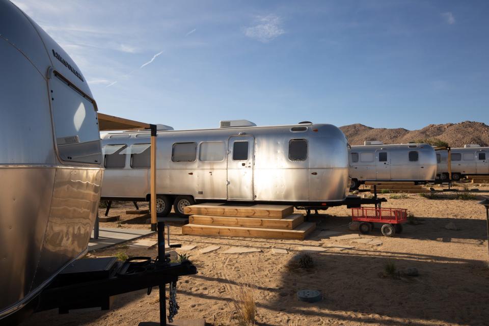 A row of Airstream trailers at Autocamp's Joshua Tree location.