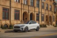 <p>The 2022 Ford Mustang Mach-E blends popular elements of the past and present in a highly desirable package that bodes well for the future of electric vehicles, which is why we gave it an <a href="https://www.caranddriver.com/features/a38873223/2022-editors-choice/" rel="nofollow noopener" target="_blank" data-ylk="slk:Editors' Choice award;elm:context_link;itc:0;sec:content-canvas" class="link ">Editors' Choice award</a>. While it seems sacrilegious that <a href="https://www.caranddriver.com/ford" rel="nofollow noopener" target="_blank" data-ylk="slk:Ford;elm:context_link;itc:0;sec:content-canvas" class="link ">Ford</a> would call a crossover EV a <a href="https://www.caranddriver.com/ford/mustang" rel="nofollow noopener" target="_blank" data-ylk="slk:Mustang;elm:context_link;itc:0;sec:content-canvas" class="link ">Mustang</a>, pairing the iconic nameplate with an in-demand body style is smart marketing. Along with its attention-getting appearance, the Mach-E has a handsomely appointed interior that's brimming with the latest tech. It also has nifty storage solutions, a spacious back seat, and lots of cargo space. Get behind the wheel and the electrified Mustang feels agile and quick. The sportiest version hits 60 mph in 3.7 seconds (<a href="https://www.caranddriver.com/reviews/a36030144/2021-ford-mustang-mach-1-drive/" rel="nofollow noopener" target="_blank" data-ylk="slk:quicker than a Mustang Mach 1;elm:context_link;itc:0;sec:content-canvas" class="link ">quicker than a Mustang Mach 1</a>) and the rangiest versions are estimated to travel more than 300 miles per charge. All that and more makes the 2022 Mustang Mach-E a transcendent EV.</p><p><a class="link " href="https://www.caranddriver.com/ford/mustang-mach-e" rel="nofollow noopener" target="_blank" data-ylk="slk:Review, Pricing, and Specs;elm:context_link;itc:0;sec:content-canvas">Review, Pricing, and Specs</a></p>