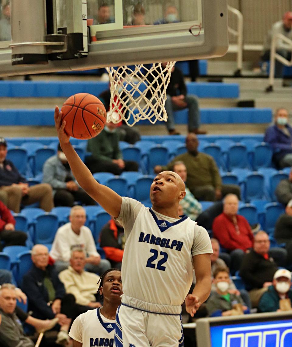 Randolph's Camden Rainford finishes a layup against Wahconah in the Division 4 state semifinals at Worcester State University on Wednesday, March 16, 2022.