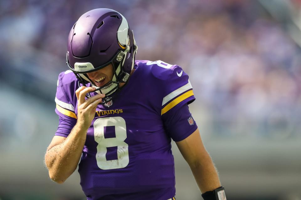 Minnesota Vikings quarterback Kirk Cousins (8) reacts during the third quarter against the Buffalo Bills at U.S. Bank Stadium.