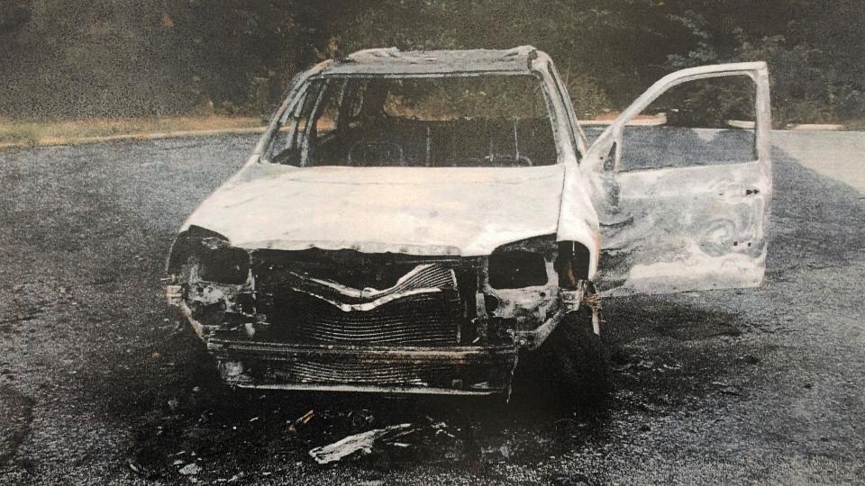 Four days after she disappeared, Lori Ann Slesinski's car suddenly exploded into a fireball on a desolate cul-de-sac outside a construction site, not far from her home. Lori was not in the torched car, police said. / Credit: Lee County Court