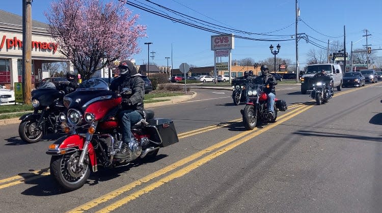 Members of the Bucks County Riders motorcycle club escort Matt Small, a bike enthusiast, and his family on Woodbourne Road in Levittown as he returned from Ireland, where sepsis nearly killed him.