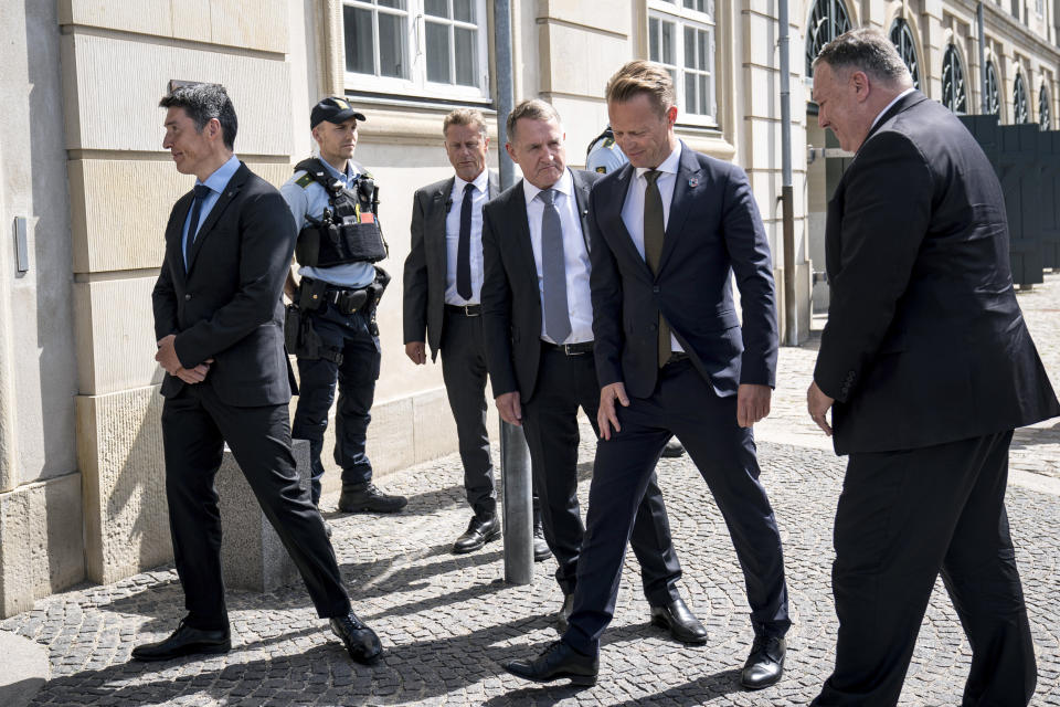 From left, Greenland's Naalakkersuisoq for Foreign Affairs, Steen Lynge, Faroe Islands' national board member for foreign affairs, Jenis av Rana, Danish Foreign Minister Jeppe Kofod, and US Secretary of State Mike Pompeo enter the Ministry of Foreign Affairs, Eigtveds Pakhus, in Copenhagen, Denmark, Wednesday, July 22, 2020. Pompeo arrived in Denmark on Wednesday for meetings with the country's leaders that are likely to address the construction of a disputed gas pipeline which Washington opposes. (Niels Christian Vilmann/Ritzau Scanpix via AP)