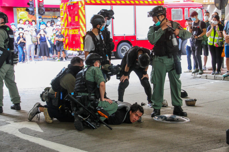A man is arrested in Wan Chai during street protests against the new national security law in Hong Kong, 1st July 2020 (Photo by Tommy Walker/NurPhoto via Getty Images)
