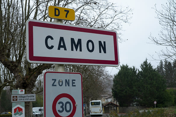This video grab from an AFPTV video taken and released on December 15, 2023 shows a road sign at the entrance of the village of Camon, south-western France, after Alex Batty, a British boy who disappeared in Spain six years ago when he was 11, has been found near, in a mountainous area, in France on December 14, 2023. The boy, Alex Batty, now 17, was found close to the town of Revel southeast of the southern city of Toulouse, regional prosecutors said. The La Depeche du Midi regional newspaper said he had been found by a student named Fabien Accidini after the youngster had been wandering for some four days in the mountainous area. (Photo by Johan DEMARLE DAVIGNY / AFPTV / AFP) (Photo by JOHAN DEMARLE DAVIGNY/AFPTV/AFP via Getty Images)