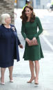 Kate donned a new forest green Emilia Wickstead dress (similar to a lavender number she owns) to open the new Anna Freud Centre of Excellence in London. She teamed it with her Gianvito Rossi ‘praline’ pumps and her Mulberry ‘Amberley’ clutch. [Photo: PA]