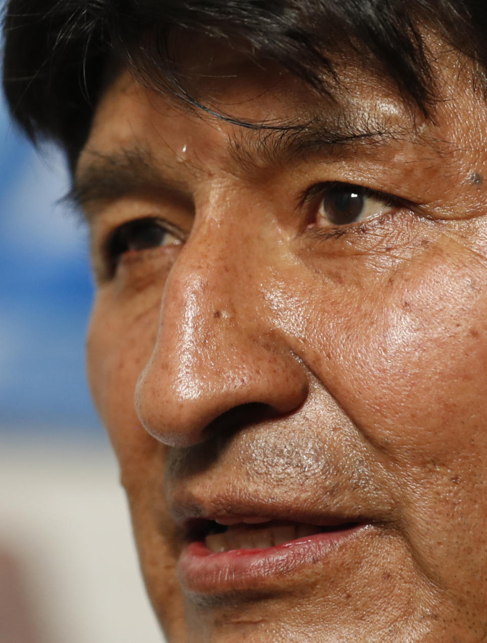 Former Bolivian President Evo Morales speaks during an interview with The Associated Press in Mexico City, Thursday, Nov. 14, 2019. Mexico granted asylum to Morales, who resigned on Nov. 10 under mounting pressure from the military and the public after his re-election victory triggered weeks of fraud allegations and deadly protests. (AP Photo/Eduardo Verdugo)