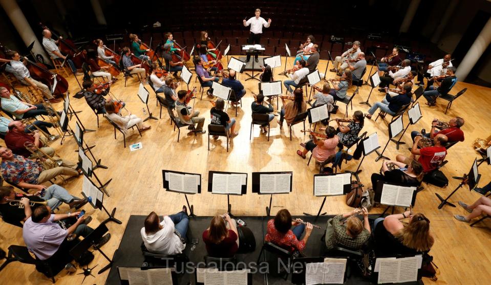 Adam Flatt directs during rehearsal for the Tuscaloosa Symphony Orchestra Sunday, Sept. 16, 2018 in Moody Music Hall at the University of Alabama. [Staff Photo/Gary Cosby Jr.]