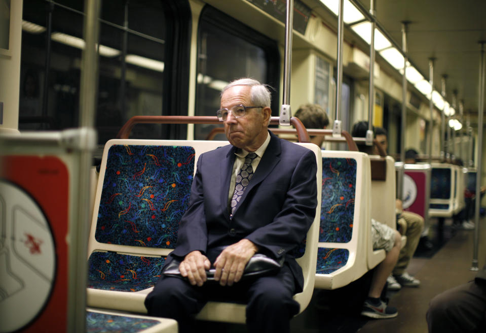 Shareholder activist John Chevedden, 67, rides the subway to the DreamWorks Animation SKG Inc stockholder meeting in Hollywood, California May 29, 2013. Chevedden has quietly transformed corporate America. Using shareholder proxy measures, the retired aerospace worker helped convince big companies to change the way they elect directors or give shareholders more of a say in executive pay. Picture taken May 29, 2013. To match special report ACTIVIST-CHEVEDDEN/  REUTERS/Lucy Nicholson (UNITED STATES - Tags: ENTERTAINMENT BUSINESS)