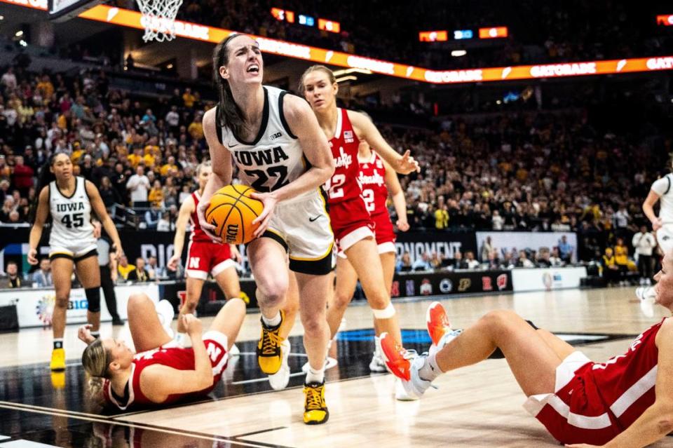 Iowa’s Caitlin Clark (22) recently passed Pete Maravich to become NCAA basketball’s all-time leading scorer.