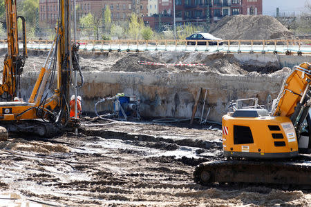 Warning tape is pictured at a construction site at Heidestrasse street near the capital's central train station, after a World War Two bomb was discovered at the site in Berlin, Germany, April 19, 2018. REUTERS/Axel Schmidt