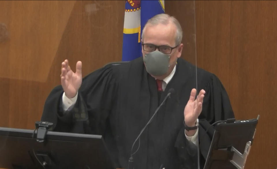 In this image from video, Hennepin County Judge Peter Cahill presides over pretrial motions before jury selection, Monday, March 8, 2021, in the trial of former Minneapolis police officer Derek Chauvin, in the May 25, 2020, death of George Floyd at the Hennepin County Courthouse in Minneapolis, Minn. (Court TV via AP, Pool)