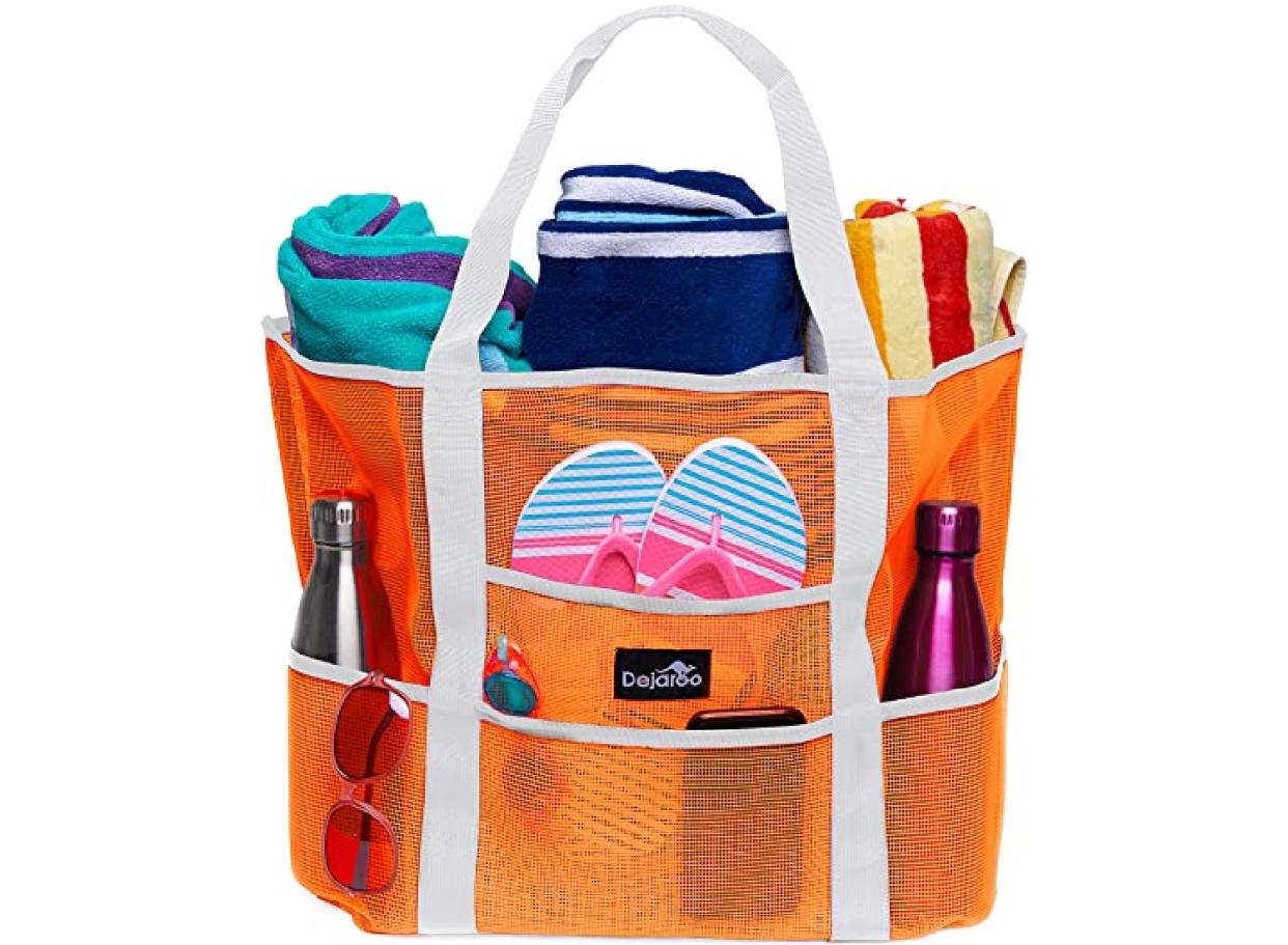 A beach bag comes with compartment of all sizes throughout for a perfect beach day