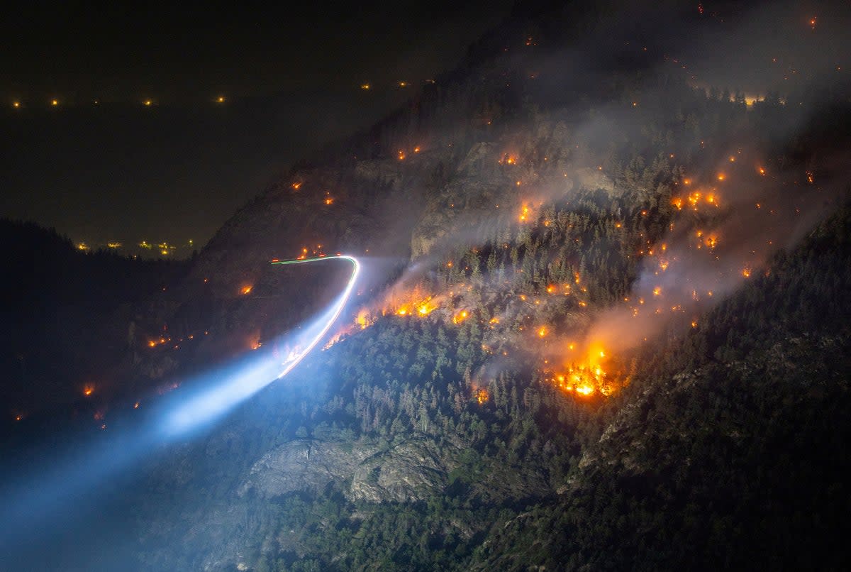 General view of a wildfire on the flank of a mountain in Bitsch near Brig, Switzerland, 18 July 2023 (REUTERS)