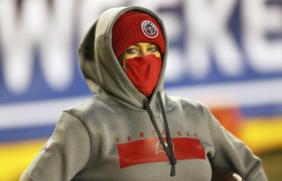 FILE - In this Jan. 9, 2021, file photo, Tampa Bay Buccaneers assistant defensive line coach Lori Locust looks on before an NFL wild-card playoff football game against the Washington Football Team in Landover, Md. Maral Javadifar, assistant strength and conditioning coach, and Locust follow in Katie Sowers' footsteps with the Bucs the only NFL team with two female coaches this season. (AP Photo/Daniel Kucin Jr., File)