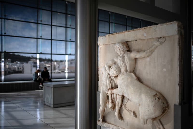 An original sculpture of the frieze of the Parthenon temple is exhibited at the Parthenon Gallery of the Acropolis Museum, in Athens