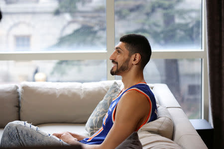 Turkish NBA player Enes Kanter prepares to watch his team, the New York Knicks, play the Washington Wizards at the O2 Arena in London on television from White Plains, New York, U.S., January 17, 2019. REUTERS/Caitlin Ochs