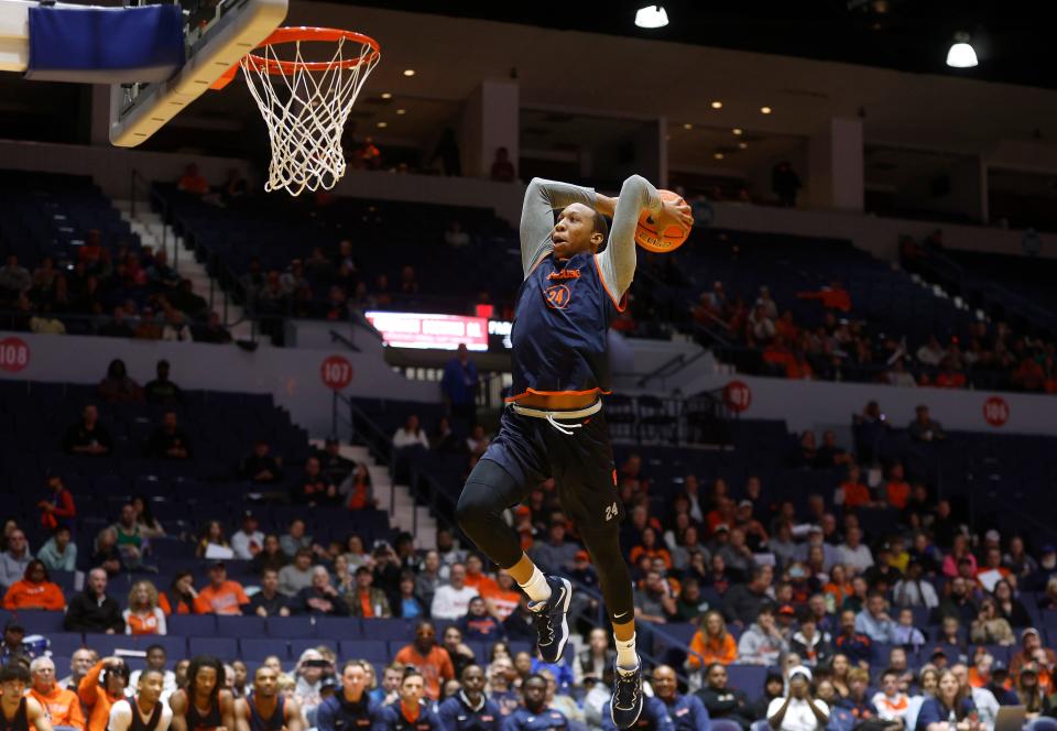 Syracuse’s Quadir Copeland takes part in the dunk contest at Blue Cross Arena during a fundraiser.