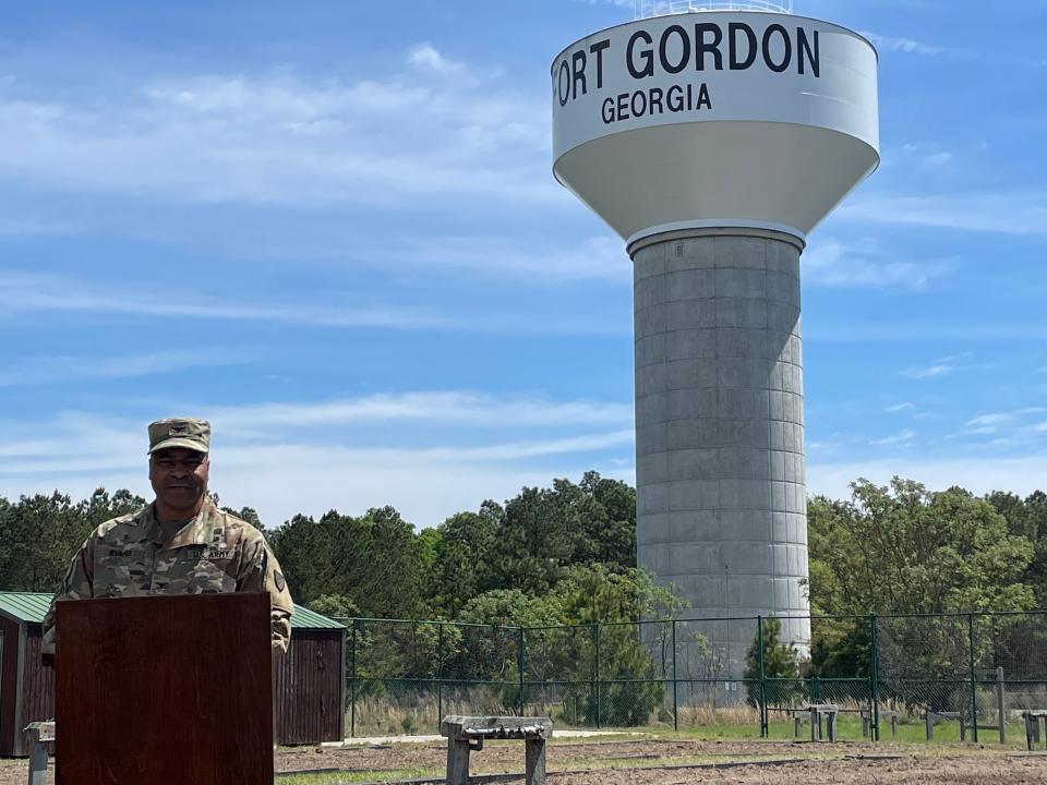 Fort Gordon Garrison Commander Col. Reginald Evans delivers remarks at the reopening of the fort's community garden, March 29, 2023.