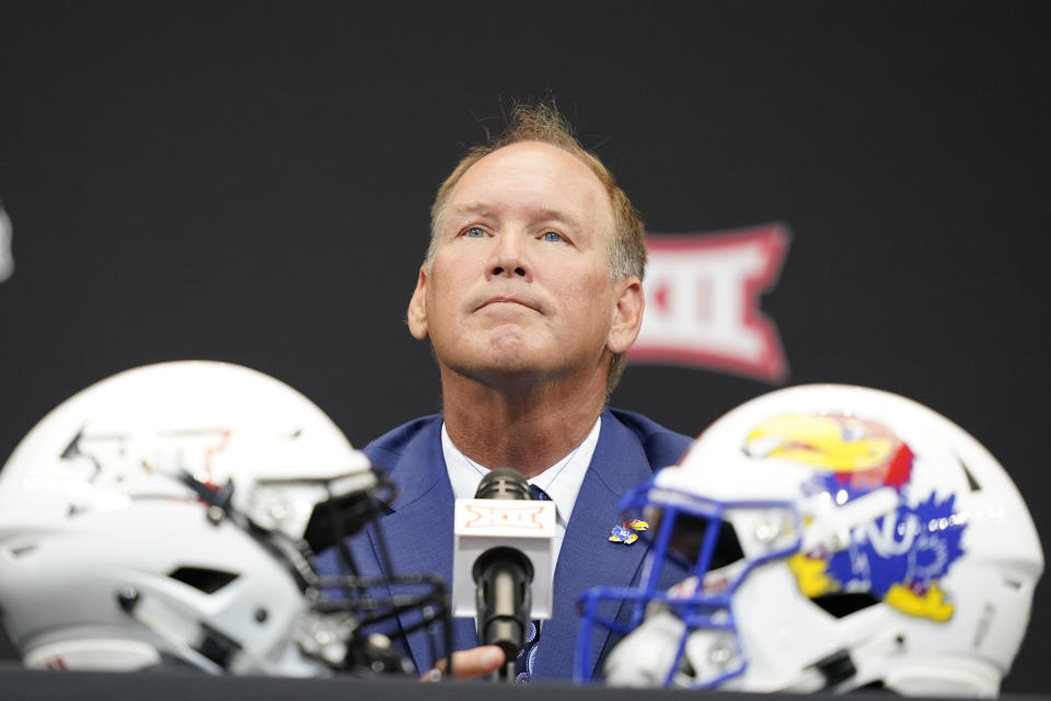 FILE - Kansas head coach Lance Leipold listens to a question from a reporter at the NCAA college football Big 12 media days in Arlington, Texas, Wednesday, July 13, 2022. Leipold took over the football program at Kansas after a winless season and a somewhat scandalous departure of his predecessor, Les Miles. And while the long-time small-school coach won just twice in Year 1, he is full of optimism heading into fall camp this season. (AP Photo/LM Otero, File)