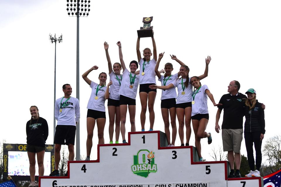 The ladies of Mason are the team champions in the Division I girls race at the OHSAA state cross-country championships, Nov. 5, 2022.