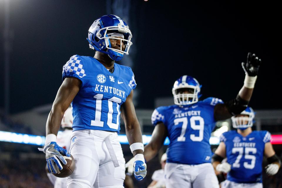 Kentucky wide receiver Chauncey Magwood (10) celebrates after scoring a touchdown during the second half of the team's NCAA college football game against Miami (Ohio) in Lexington, Ky., Saturday, Sept. 3, 2022. (AP Photo/Michael Clubb)
