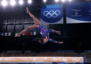 <p>Team USA's Simone Biles does what she does best, flying high on the balance beam during the women's gymnastics qualifying round on July 25. </p>