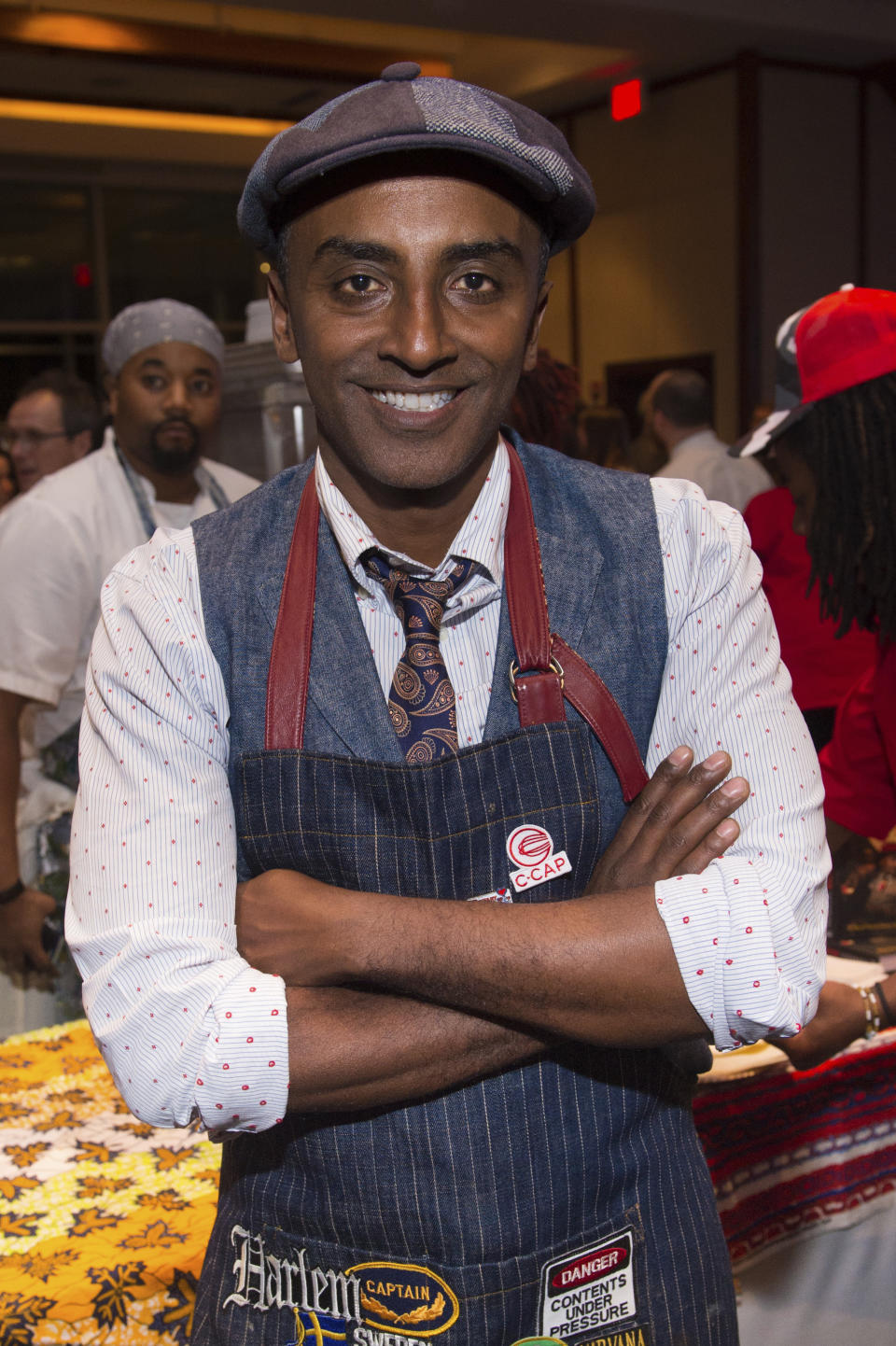 FILE - Chef and restauranteur Marcus Samuelsson participates in the C-CAP (Careers through Culinary Arts Program) annual benefit in New York on Feb. 27, 2018. Samuelsson is hoping to educate Americans and champion Black chefs in “The Rise: Black Cooks and the Soul of American Food” from Little, Brown and Company's Voracious imprint. The book has 150 recipes from two dozen top Black chefs and includes profiles of each. (Photo by Scott Roth/Invision/AP, File)