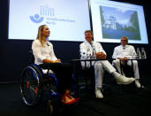 Germany's Olympic and world sprint cycling champion Kristina Vogel, Medical Director Axel Ekkernkamp and chief physician Andreas Niedeggen address a news conference for the first time since Vogel has been paralysed following a serious crash in training, at the Unfallkrankenhaus hospital in Berlin, Germany, September 12, 2018. REUTERS/Fabrizio Bensch?
