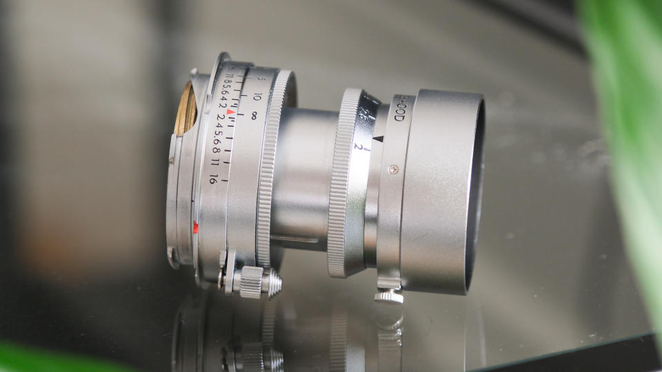 Thypoch Eureka lens on a glass surface