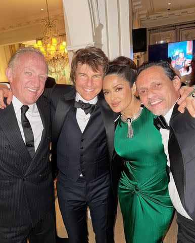 <p>Instagram/salmahayek</p> François-Henri Pinault, Tom Cruise, Salma Hayek and Marc Anthony pose for a photo at Victoria Beckham's 50th birthday party in London on April 20, 2024