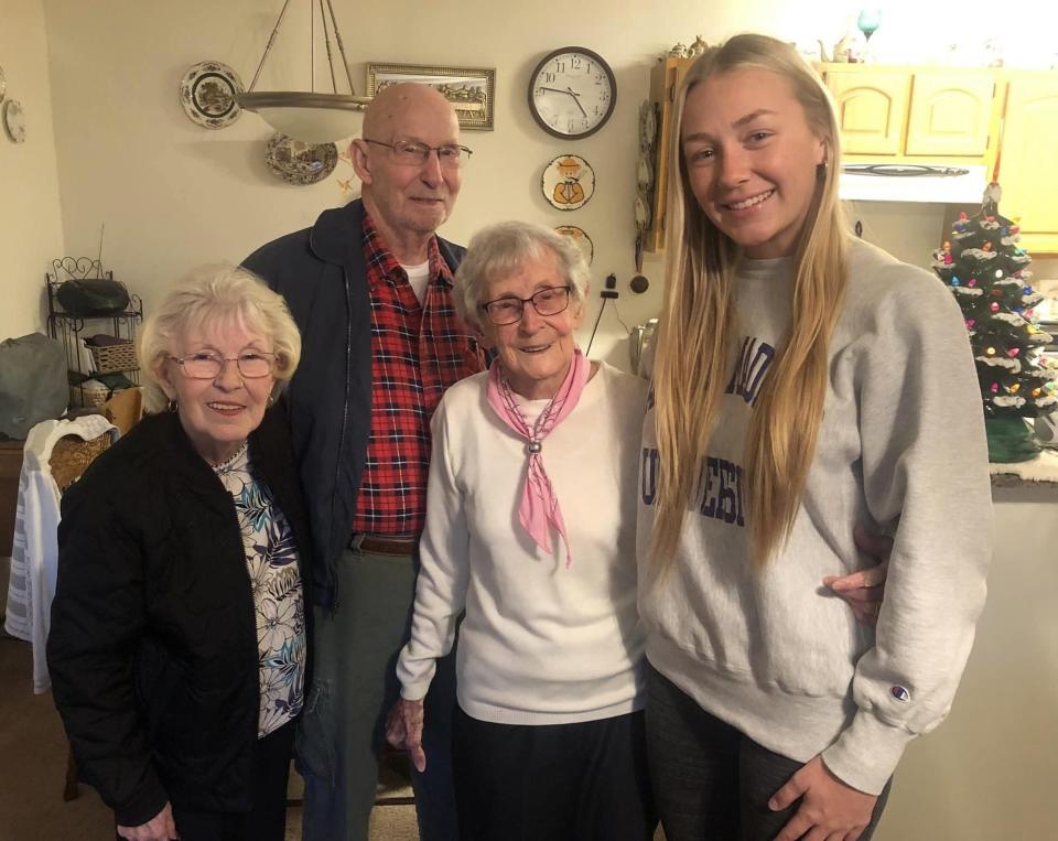 Centenarian Eva Mowen strikes a pose with her daughter and son-in-law, Elizabeth and Dorsey Kimbrell, and great granddaughter Abby Nyquist.