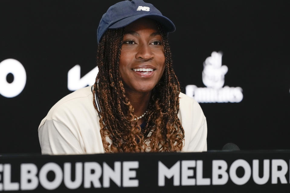 Coco Gauff of the United States reacts during a press conference ahead of the Australian Open tennis championships at Melbourne Park, Melbourne, Australia, Friday, Jan. 12, 2024. (AP Photo/Mark Baker)