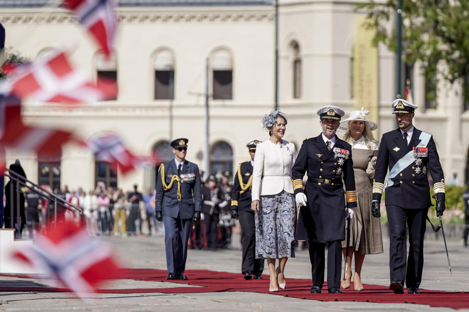 King Frederik and Queen Mary of Denmark are welcomed by Norway's King Harald, Queen Sonja, Crown Prince Haakon and Crown Princess Mette-Marit at Honnørbrygga upon their arrival in Oslo Tuesday, May 14, 2024. (Håkon Mosvold Larsen/NTB Scanpix via AP)