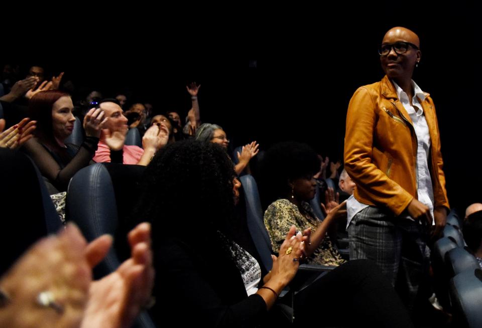 Filmmaker Tanesha Morris get applause during the StoryTellHERS event, curated by filmmaker Kristi J. Woodard, featuring the work of local female filmmakers on April 13, 2023, at Robinson Film Center.