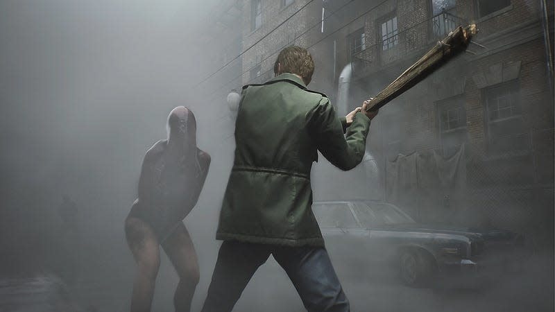 James Sunderland swings a bat at an enemy in the Silent Hill 2 remake.