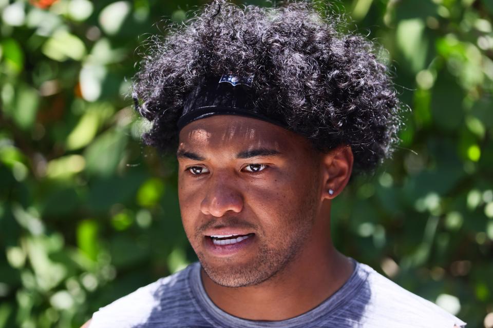 Jun 4, 2024; Miami Gardens, FL, USA; Miami Dolphins quarterback Tua Tagovailoa (1) speaks to reporters during mandatory minicamp at Baptist Health Training Complex. Mandatory Credit: Sam Navarro-USA TODAY Sports