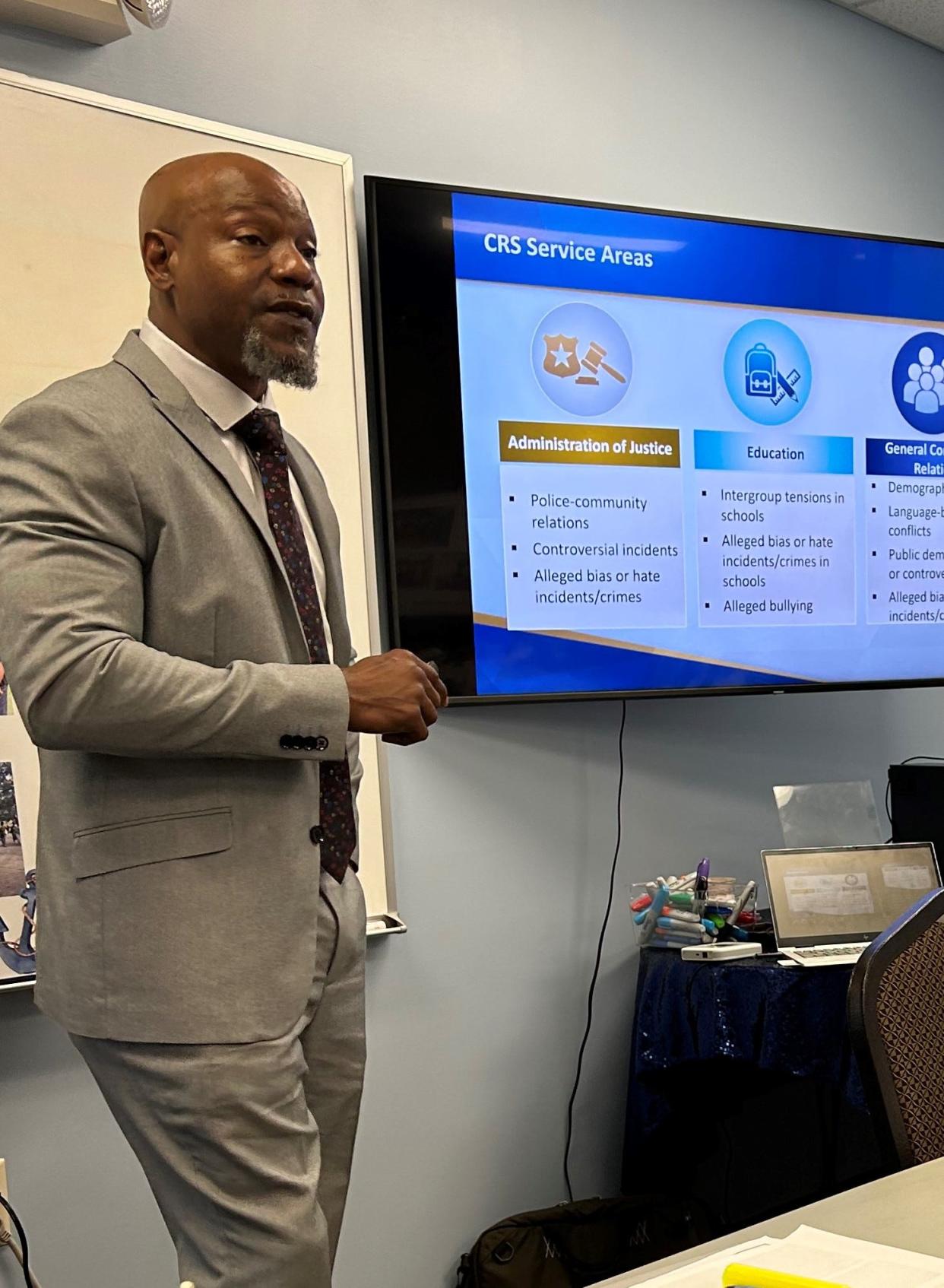 U.S. Department of Justice Conciliation Specialist, Dion Lyons presents information on the DOJ's Community Relation Service department at The Mediation Center of Savannah on Wednesday March 6, 2024.